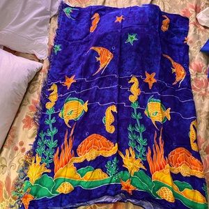 Sarong. Can act as a skirt or dress.